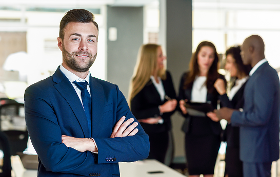 businessman-leader-modern-office-with-businesspeople-working 1 businessman-leader-modern-office-with-businesspeople-working 1
